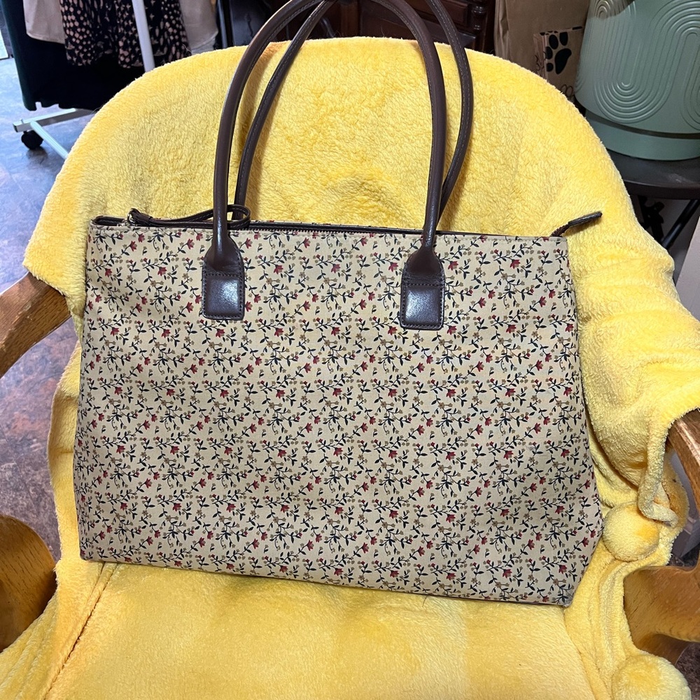 Valerie Stevens floral tote. Leather handles and bottom. In good condition.